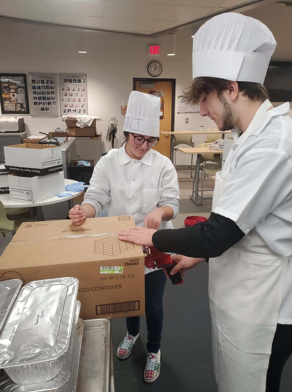 Students Packing Boxes